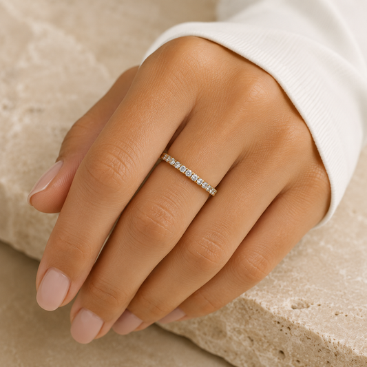 Woman wearing the Rosemere Eterna gold pavé eternity ring, everyday styling
