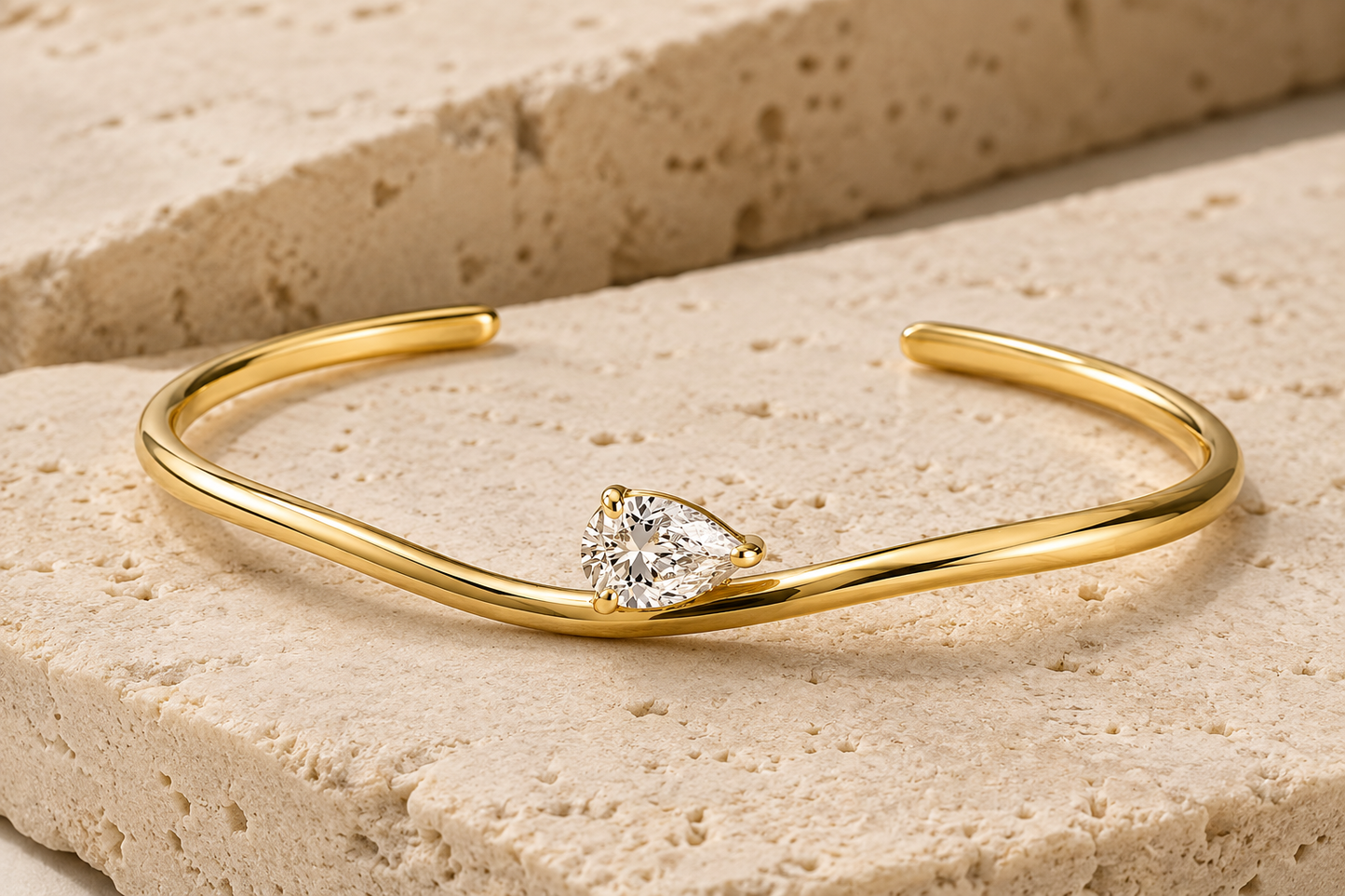 Rosemere Vivienne open cuff gold bangle with pear crystal on natural stone