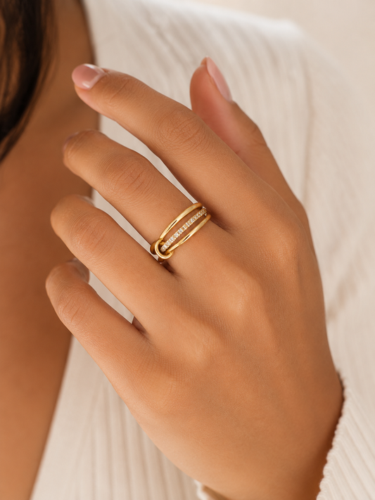 Woman wearing the Rosemere Elowen stacked gold ring, everyday styling