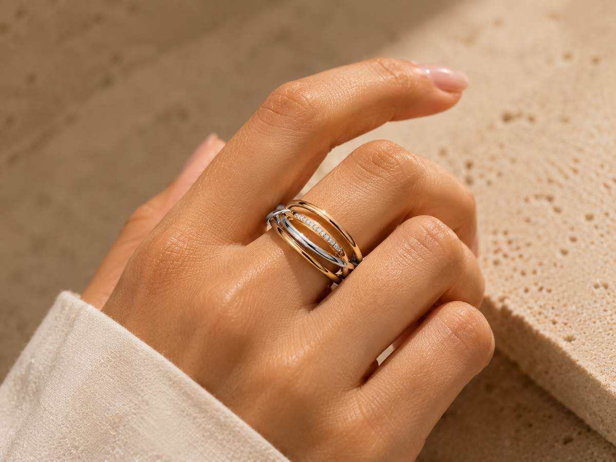 Woman wearing the Rosemere Amélie two-tone gold and silver ring, everyday styling