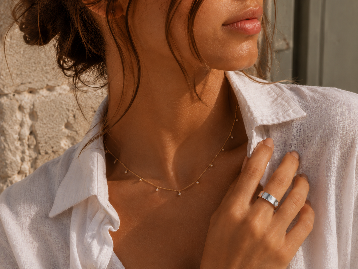 Woman wearing the Rosemere Adeline silver band ring, everyday styling