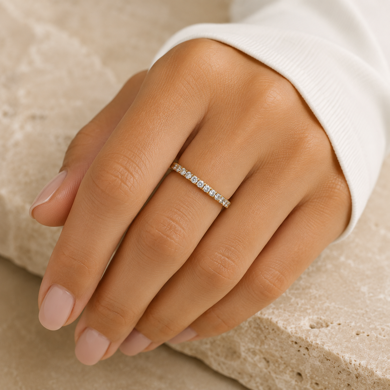 Woman wearing the Rosemere Eterna gold pavé eternity ring, everyday styling