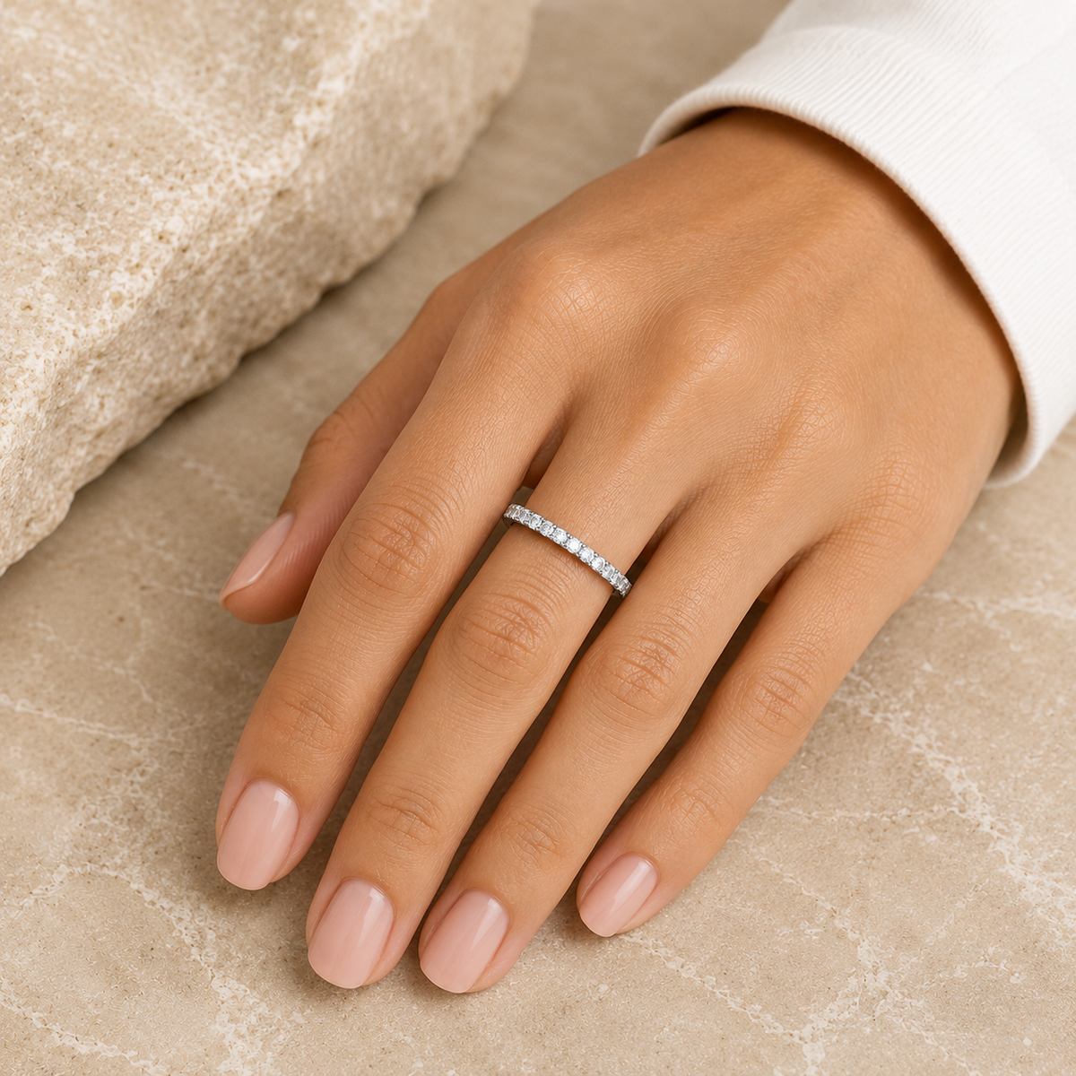 Woman wearing the Rosemere Eterna silver pavé eternity ring, everyday styling